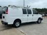 2014 White /Gray Chevrolet Express (1GCWGFCB5E1) , AUTOMATIC transmission, located at 17760 Hwy 62, Morris, OK, 74445, (918) 733-4887, 35.609104, -95.877060 - 2014 CHEVROLET EXPRESS CARGO VAN 6.0L V8 RWD FEATURING POWER LOCKS, POWER WINDOWS, MANUAL MIRRORS, MANUAL SEATS, AM/FM STEREO, LEATHER SEATS, LEATHER-WRAPPED STEERING WHEEL, TRACTION CONTROL, LOCKING METAL CONSOLE, STEEL SHELVES, SPLIT SWING-OUT RIGHT DOORS, AND TOW PACKAGE. EQUIPPED WITH A CNG FUE - Photo#4